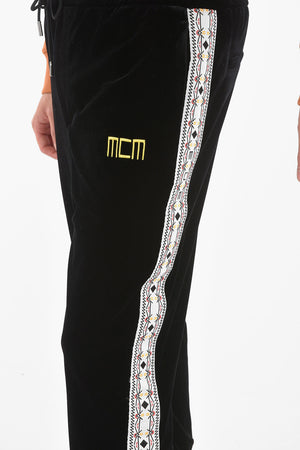 Joggers in velour con banda laterale a contrasto