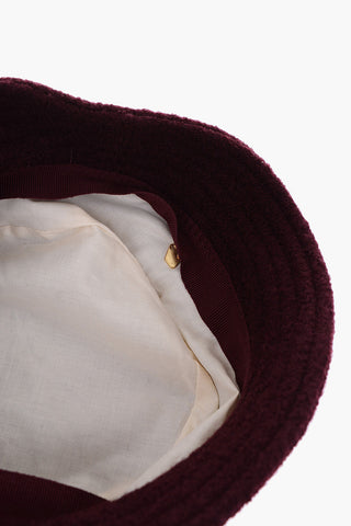 Cloche a tinta unita con dettagli dorati