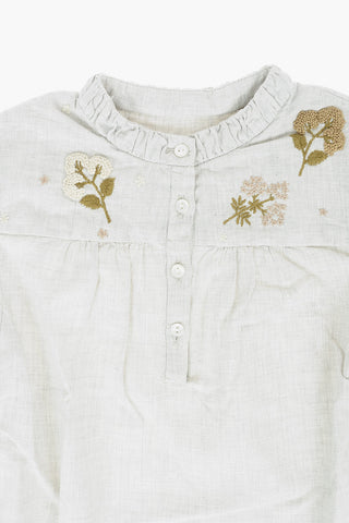 Blusa in cotone ricamata sul fronte