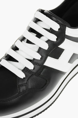Leather Sneakers with Contrasting Embossed Logo