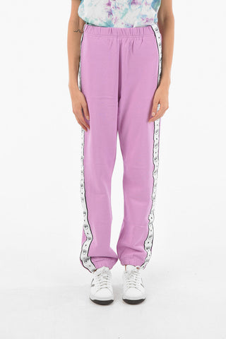 Joggers LOGOMANIA in Cotone Felpato con Bande Laterali Logate
