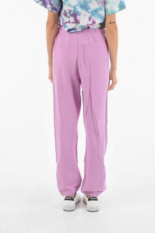 Joggers LOGOMANIA in Cotone Felpato con Bande Laterali Logate
