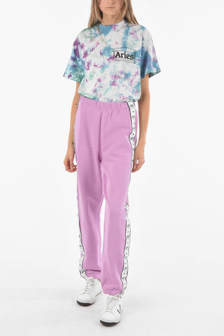 Joggers LOGOMANIA in Cotone Felpato con Bande Laterali Logate

