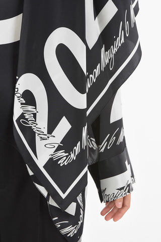 MM6 Blusa asimmetrica con logo all over