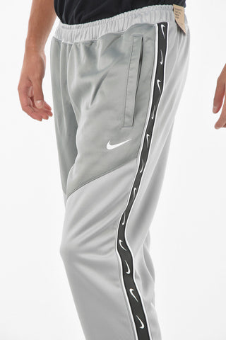 Joggers A 2 Tasche Con Banda Laterale Logata