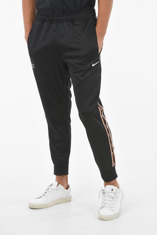Joggers A 2 Tasche Con Banda Laterale Logata