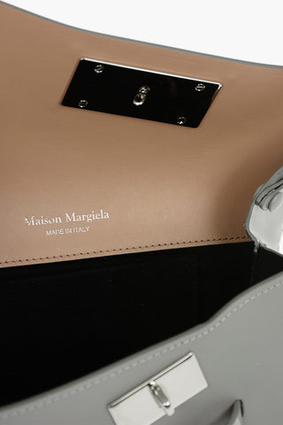 MM11 patent leather SNATCHED mini bag with removable chain shoulder strap