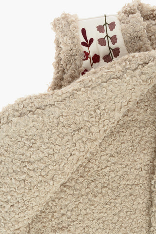 Floral-Embroidered Sleeveless Jacket with Faux Fur Inner