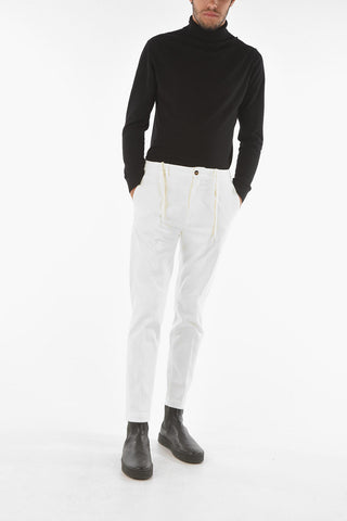Pantaloni MITTE a una pince con elastico in vita