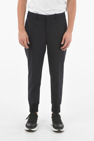 Pantaloni slim fit con polsino alla caviglia