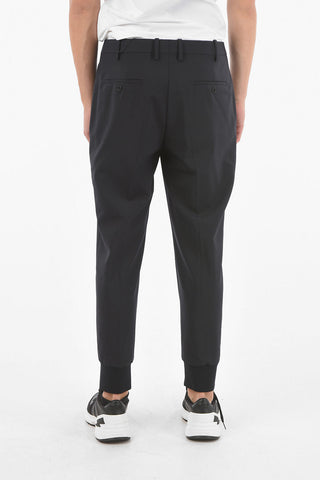 Pantaloni slim fit con polsino alla caviglia