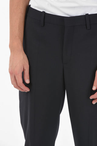 Pantaloni slim fit con polsino alla caviglia