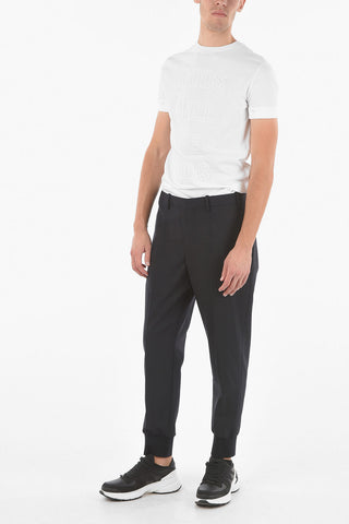 Pantaloni slim fit con polsino alla caviglia