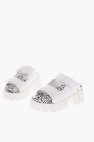LOVE 5cm All Over Logoed Sole Leather TASSEL70 Sabot with Cut-Out Details