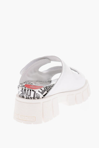 LOVE 5cm All Over Logoed Sole Leather TASSEL70 Sabot with Cut-Out Details