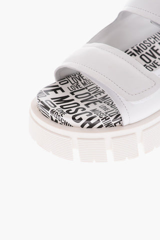 LOVE 5cm All Over Logoed Sole Leather TASSEL70 Sabot with Cut-Out Details