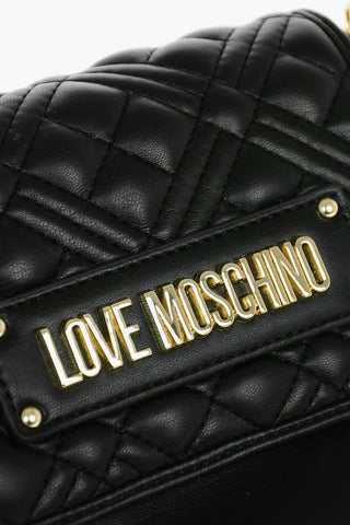 LOVE Quilted Faux Leather Saddle Bag
