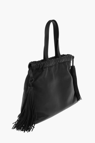 Soft Leather Shoulder Bag with Drawstring embellished with Tassels