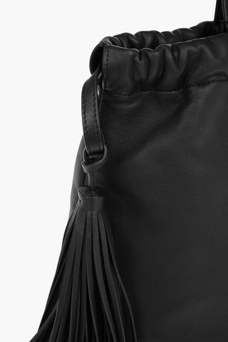Soft Leather Shoulder Bag with Drawstring embellished with Tassels