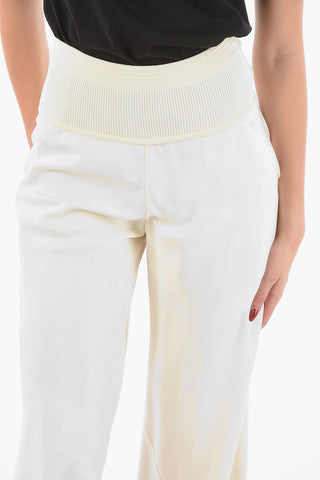Pantaloni Flare a Vita Alta in Satin con Banda Elasticizzata a Costine