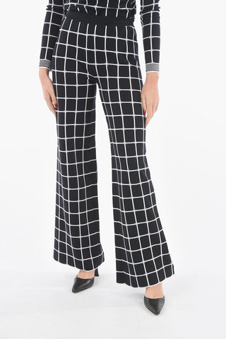 Pantaloni Flare in Jersey a Quadri Windowpane con Orlo Smerlato