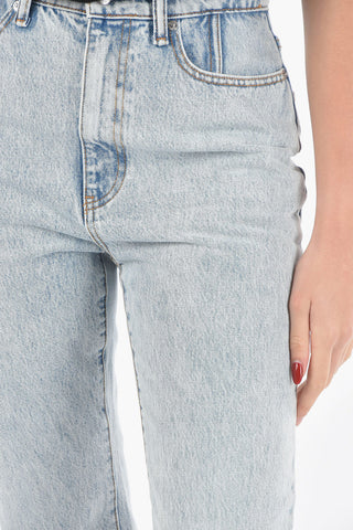 Light-wash High-waisted Jeans with Distressed Detailing at Knee