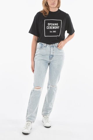 Light-wash High-waisted Jeans with Distressed Detailing at Knee