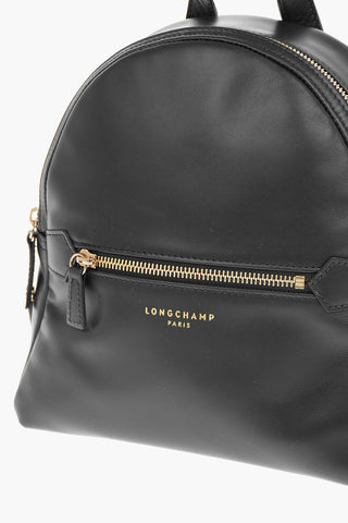 Front Pocketed Leather Backpack