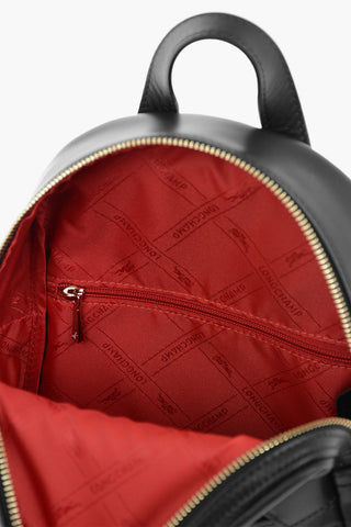 Front Pocketed Leather Backpack