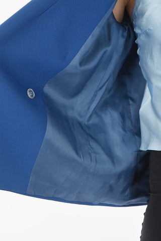 center vent peak lapel double-breasted blazer