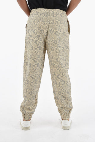 Pantaloni Jogger in Stampa Pitone con Elastici alla Caviglia
