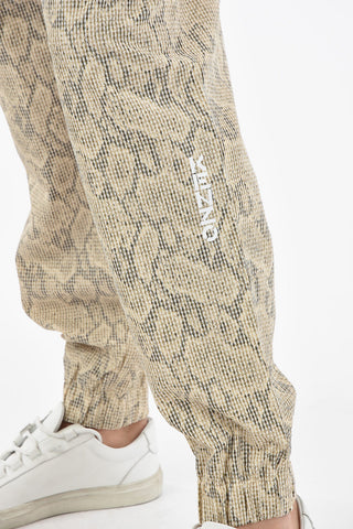 Pantaloni Jogger in Stampa Pitone con Elastici alla Caviglia