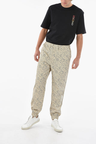 Pantaloni Jogger in Stampa Pitone con Elastici alla Caviglia