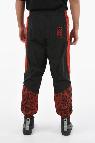 HOT ANIMALIER Pantaloni Jogger In Nylon Con Stampa Leopardo