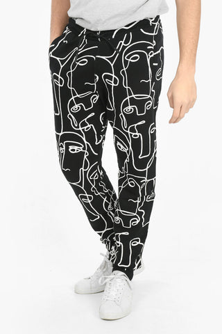 Joggers ALL OVER FACES in Cotone Garzato