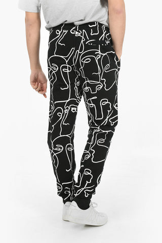 Joggers ALL OVER FACES in Cotone Garzato