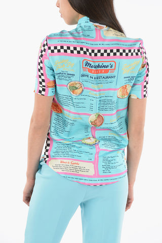 COUTURE! Silk-printed LADIES WHO LUNCH Shortsleeved Shirt with Ruffles