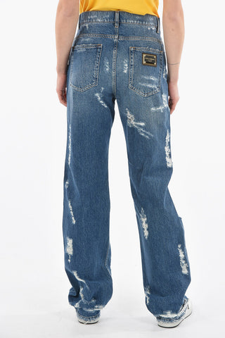 Jeans a Zampa Cinque Tasche Effetto Strappato con Toppa Logo sul Retro 21cm
