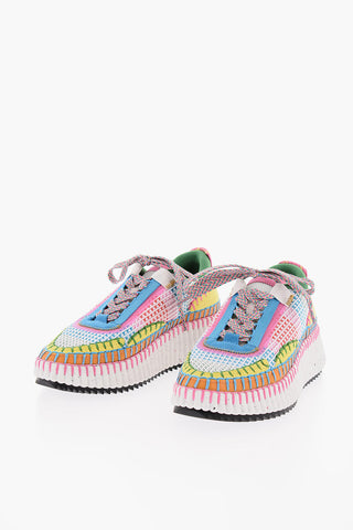 Visible Stitching NAMA Sneakers