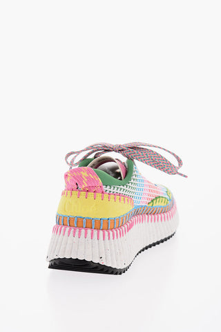 Visible Stitching NAMA Sneakers