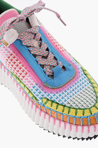 Visible Stitching NAMA Sneakers