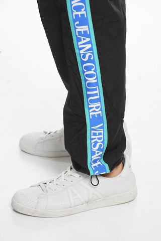 COUTURE Contrasting Band TAPE Nylon Joggers