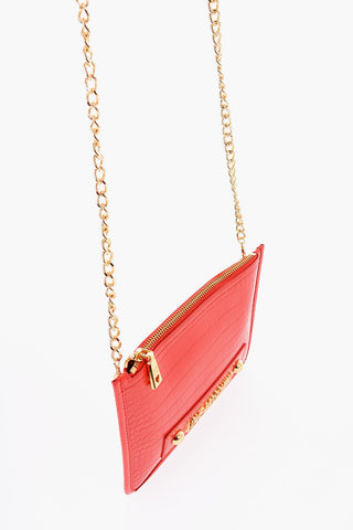 LOVE Clutch aus Kunstleder in Krokodil-Optik mit goldenem Logo