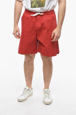 Shorts mit 3 Taschen und kontrastierenden Kordeln
