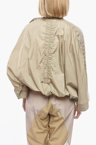 Batwing-sleeved Windrebreaker with Ruffled Detailing