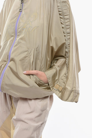 Batwing-sleeved Windrebreaker with Ruffled Detailing