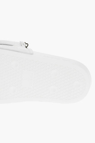 Slides POUCHYLETTE Con Pouch Logata