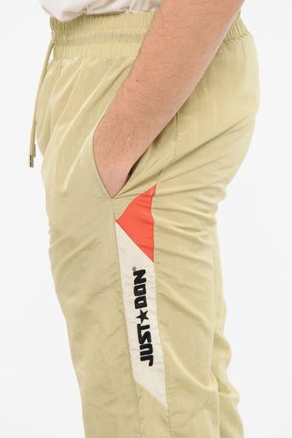 Joggers in Nylon a 3 Tasche con Zip alla Caviglia