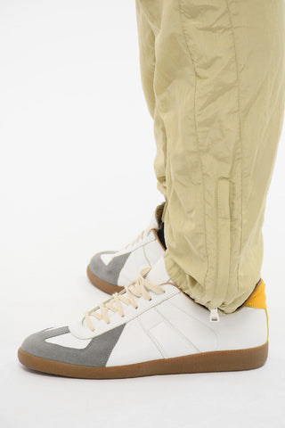 Joggers in Nylon a 3 Tasche con Zip alla Caviglia