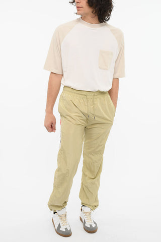 Joggers in Nylon a 3 Tasche con Zip alla Caviglia